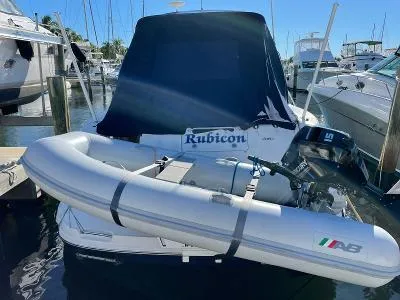 Slide: The Image of 2005 Sea Ray 340 Sundancer with dinghy in marina. - 24