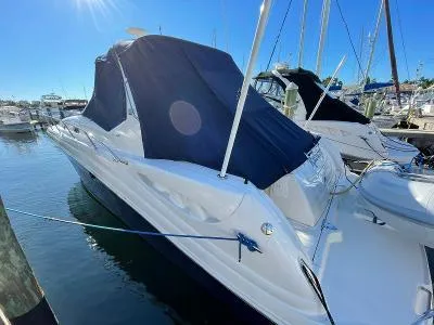 Slide: The Image of 2005 Sea Ray 340 Sundancer docked, blue sky. - 25