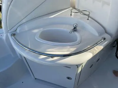 Slide: The Image of Sea Ray 340 Sundancer 2005 kitchen area with sink. - 3