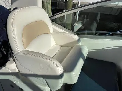 Slide: The Image of Seat in the cockpit of a 2005 Sea Ray 340 Sundancer yacht. - 41