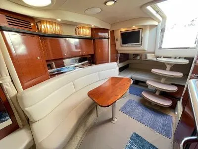 Slide: The Image of Interior of 2005 Sea Ray 340 Sundancer with elegant furnishings. - 42