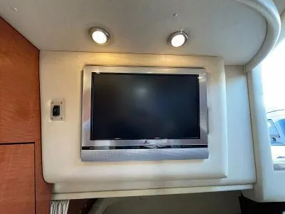 Slide: The Image of Interior of 2005 Sea Ray 340 Sundancer with built-in TV. - 45