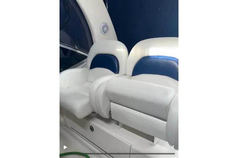 Slide: The Image of White and blue seating on 2005 Sea Ray 340 Sundancer boat. - 63