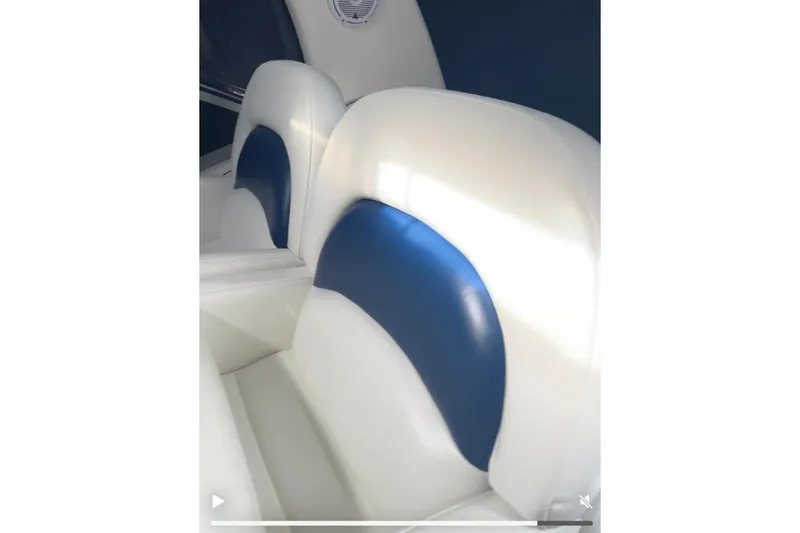 Slide: The Image of White and blue seating on a 2005 Sea Ray 340 Sundancer boat. - 65