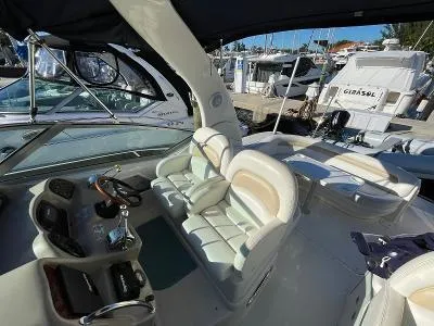 Slide: The Image of Interior of a 2005 Sea Ray 340 Sundancer yacht in a marina. - 7