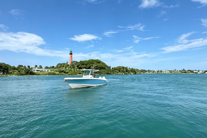 Slide: The Image of Boston Whaler 330 Outrage 2026 - 2