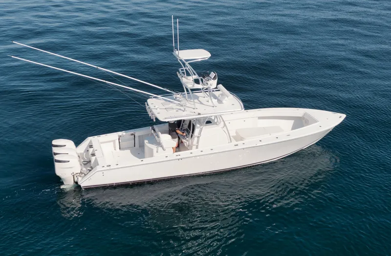 The Image of 2010 Jupiter 38 CC boat on calm blue water, aerial view. - 0