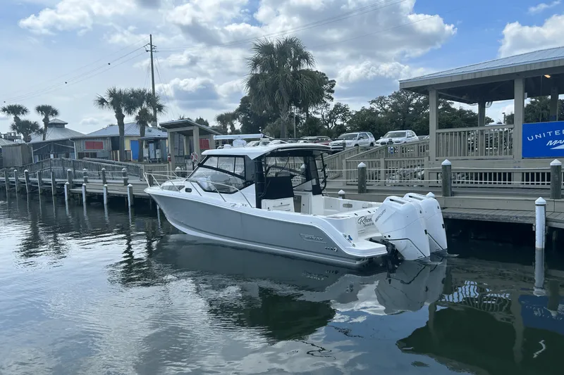 Slide: The Image of Boston Whaler 325 Conquest 2025 - 5