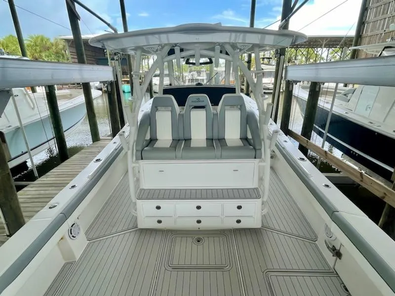 Slide: The Image of 2020 Regulator 41 boat interior with seating and storage. - 15