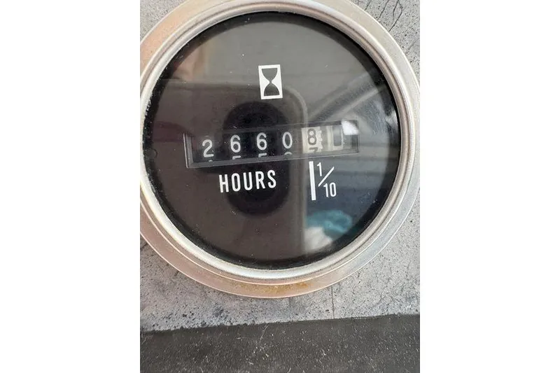 Slide: The Image of Hour meter showing 26,608.1 hours on a 1998 Leopard Catamaran. - 45