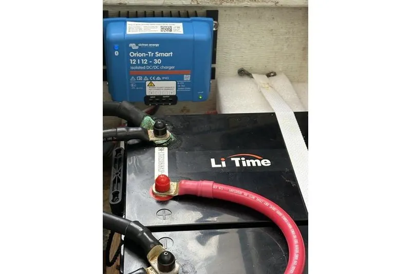 Slide: The Image of Battery setup with Li Time battery and Orion-Tr Smart charger on Leopard Catamaran, 1998 model. - 48