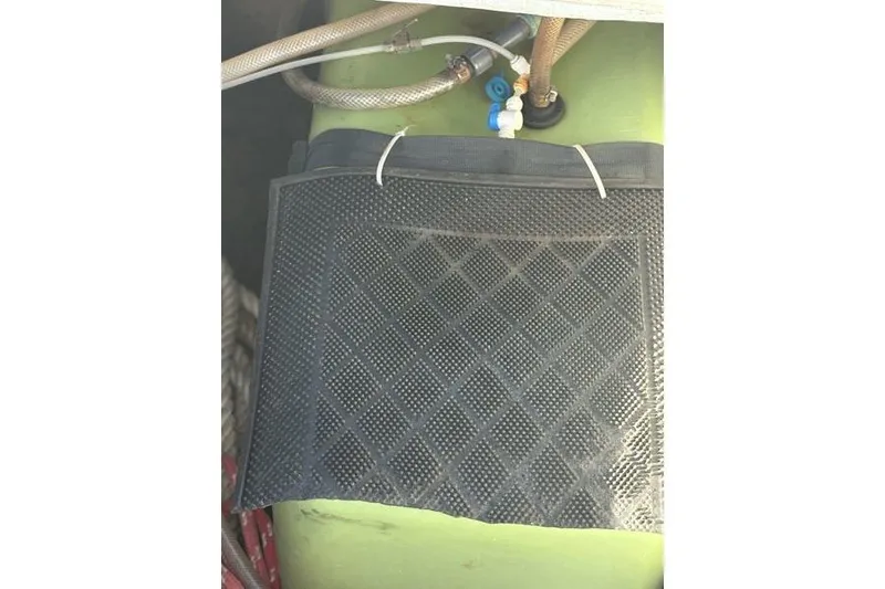 Slide: The Image of Fuel tank and hoses in a 1998 Leopard Catamaran engine compartment. - 72