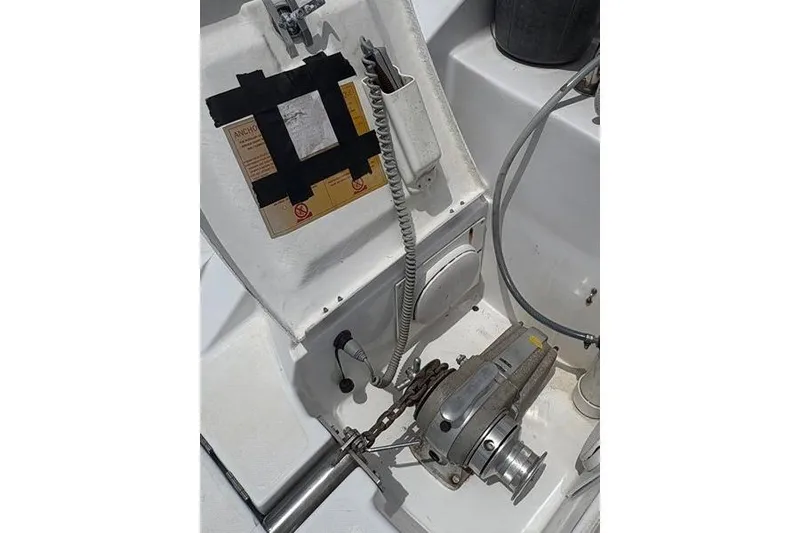 Slide: The Image of 1998 Leopard Catamaran deck with anchor winch and control panel. - 75