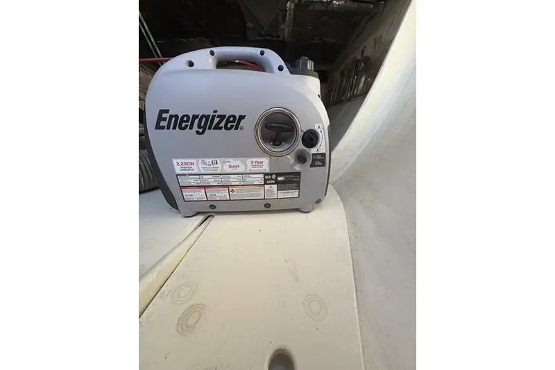 Slide: The Image of Portable Energizer generator on 1998 Leopard Catamaran, showcasing power specifications and design. - 88