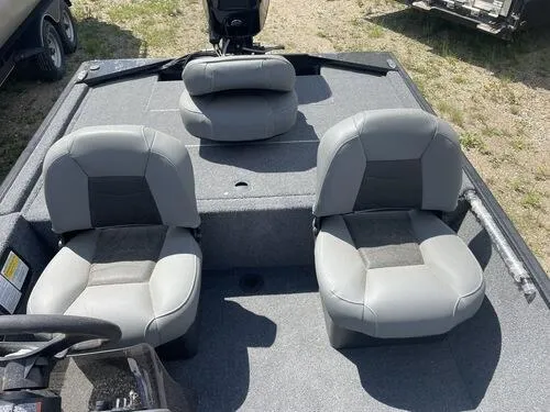 Slide: The Image of 2022 Tracker Bass Tracker Classic XL boat interior with three gray seats. - 4