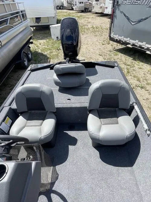 Slide: The Image of 2022 Tracker Bass Tracker Classic XL fishing boat with dual seats and outboard motor. - 5