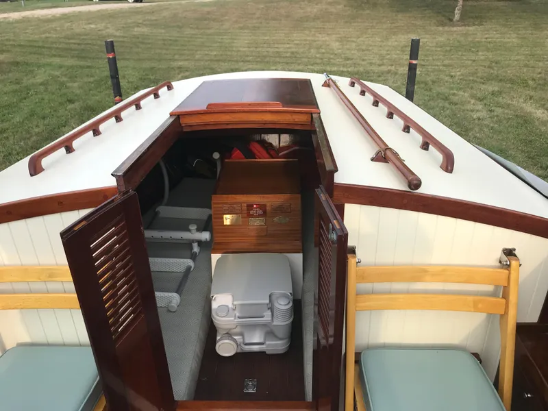 Slide: The Image of Classic 2002 Jesperson/Zimmer Design boat interior with wooden accents and seating. - 11