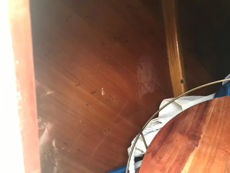 Slide: The Image of Wooden interior of a 2002 Classic Jesperson/Zimmer Design boat, featuring polished surfaces. - 21