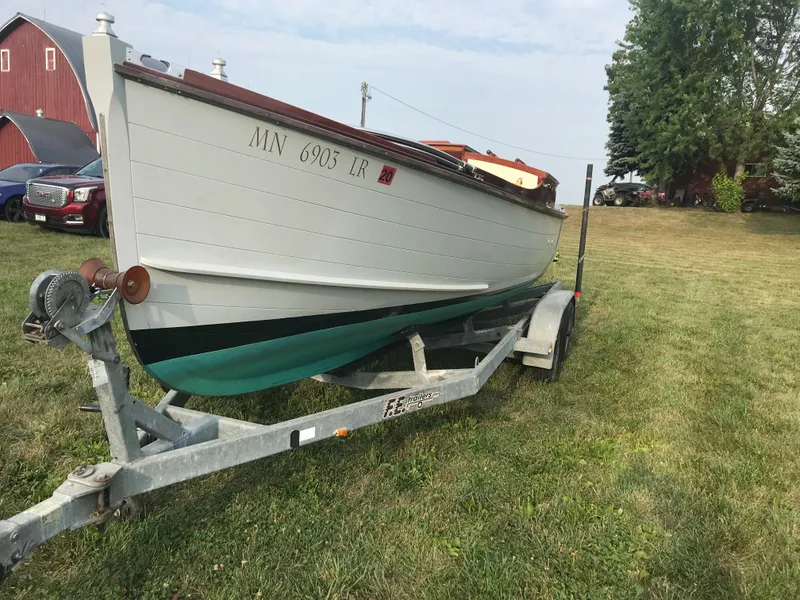 Slide: The Image of Classic 2002 Jesperson/Zimmer Design boat on trailer, parked on grassy field. - 5