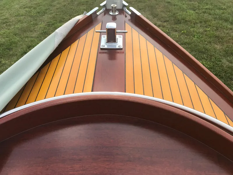 Slide: The Image of Classic 2002 Jesperson/Zimmer Design boat with polished wood deck and chrome details. - 9