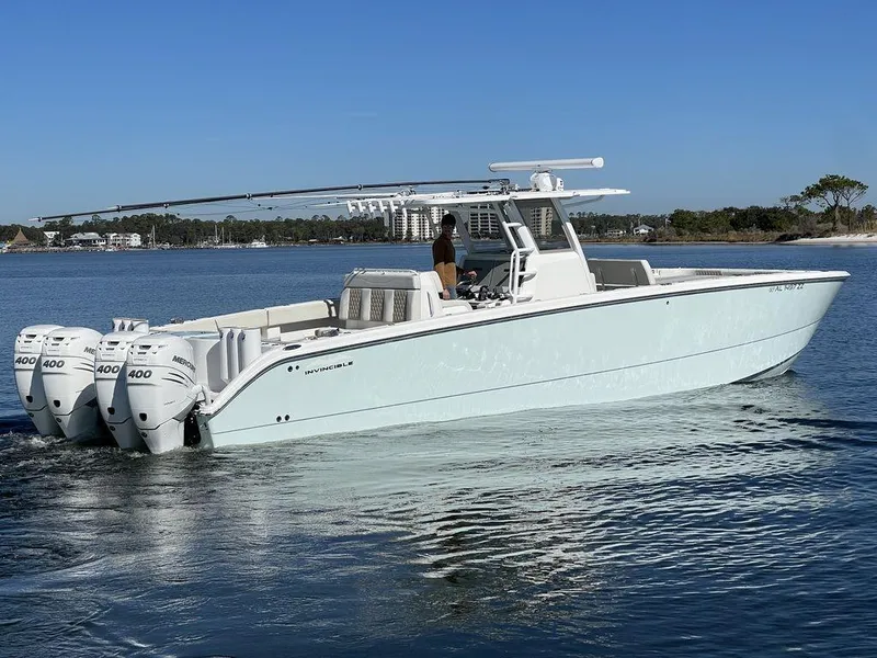 The Image of 2019 Invincible 40 Catamaran with triple 400 horsepower engines on calm water. - 0