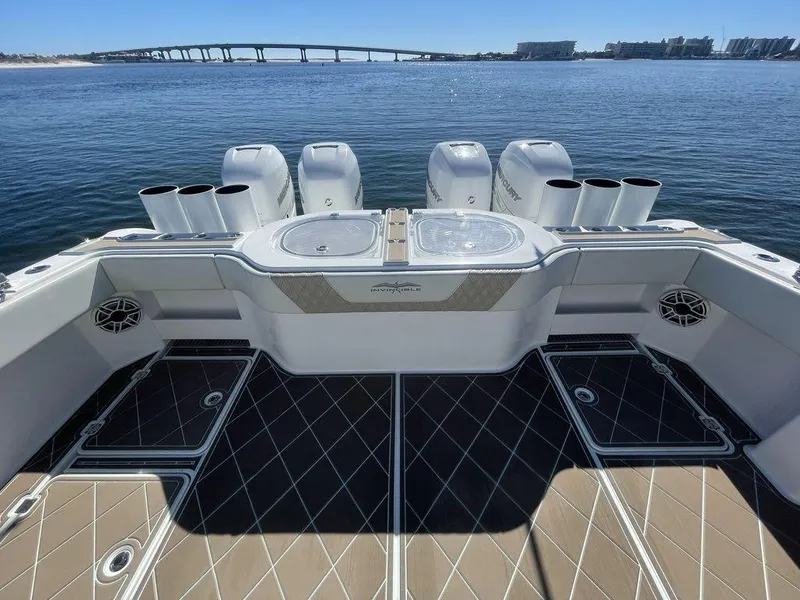 Slide: The Image of 2019 Invincible 40 Catamaran with dual livewells and Mercury outboard engines. - 11