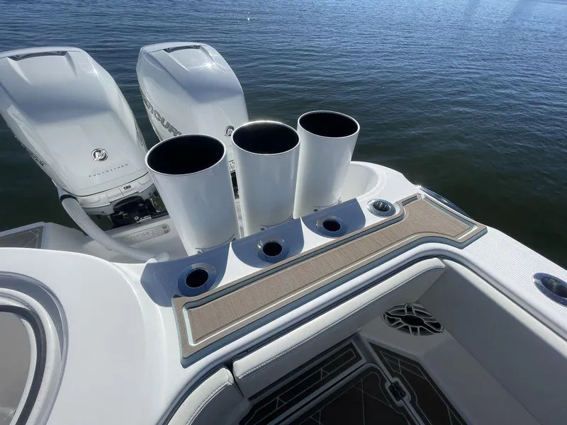 Slide: The Image of 2019 Invincible 40 Catamaran deck with storage compartments and non-slip flooring. - 14