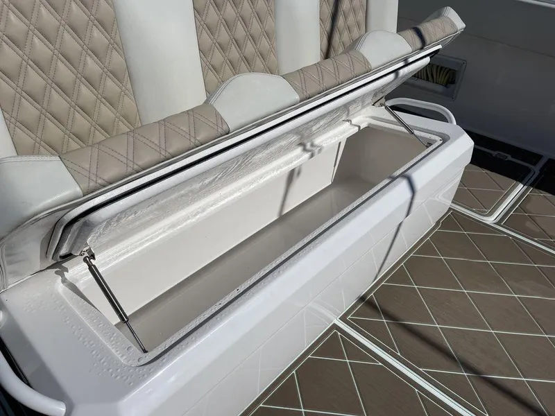 Slide: The Image of 2019 Invincible 40 Catamaran seating and storage compartments. - 19
