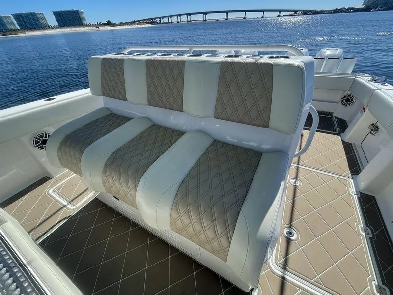 Slide: The Image of Helm station of 2019 Invincible 40 Catamaran with dual screens and steering wheel. - 21