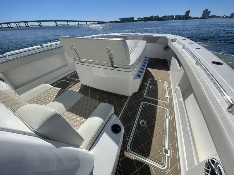 Slide: The Image of 2019 Invincible 40 Catamaran seating area with diamond-stitched upholstery. - 27