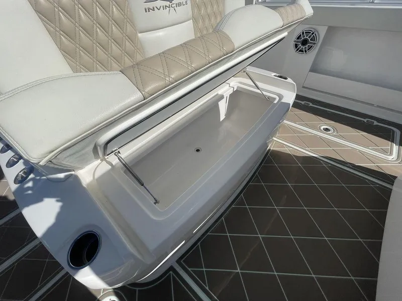 Slide: The Image of 2019 Invincible 40 Catamaran with luxurious seating and scenic water view. - 29