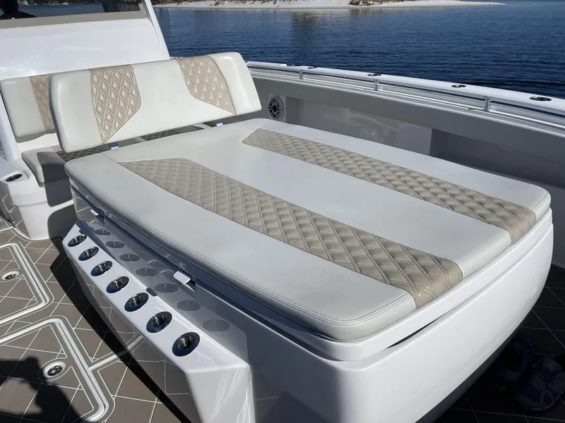 Slide: The Image of 2019 Invincible 40 Catamaran on calm waters with clear blue sky. - 31