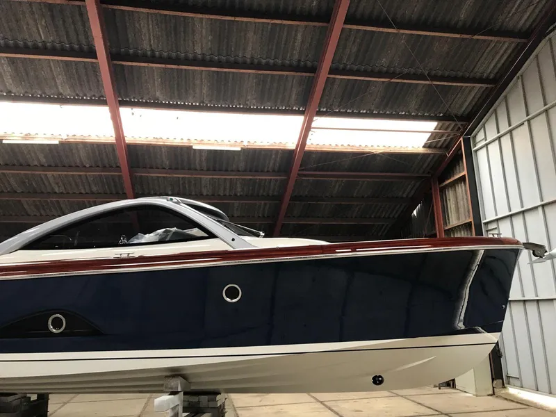 Slide: The Image of 2025 Keizer 42 boat in a warehouse, side view. - 5