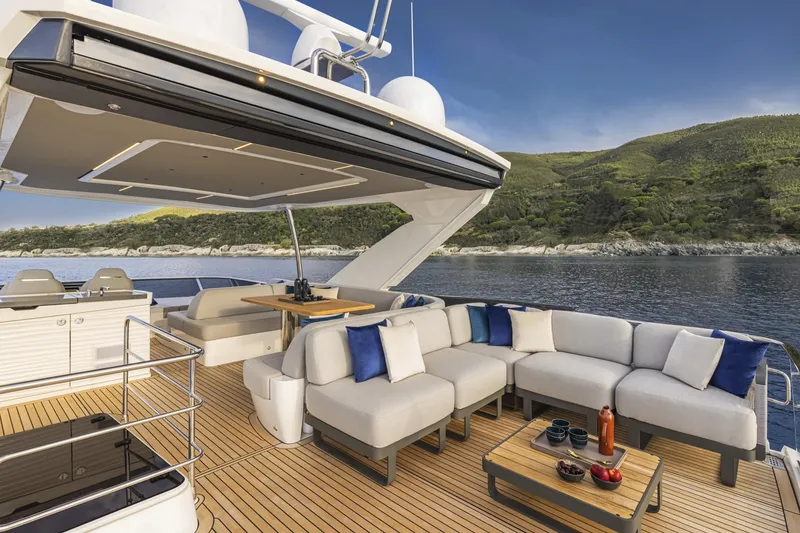 Slide: The Image of Luxurious deck of 2024 Absolute 60 Fly yacht with scenic ocean view. - 28