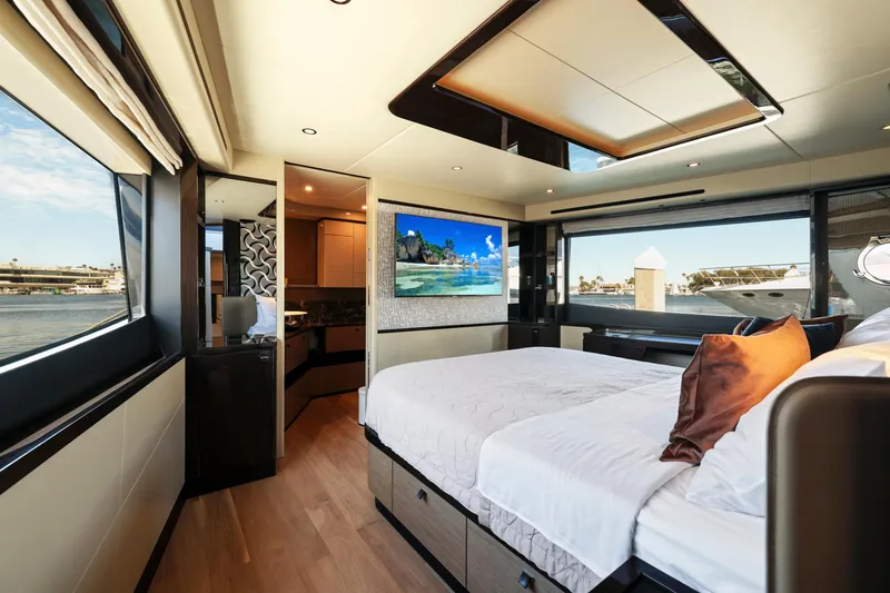 Slide: The Image of Luxurious bedroom interior of 2024 Absolute 60 Fly yacht with waterfront views. - 37
