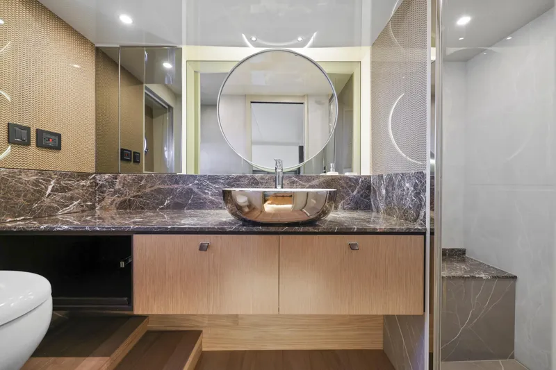 Slide: The Image of Luxurious bathroom in 2024 Absolute 60 Fly yacht with marble countertop and modern fixtures. - 48