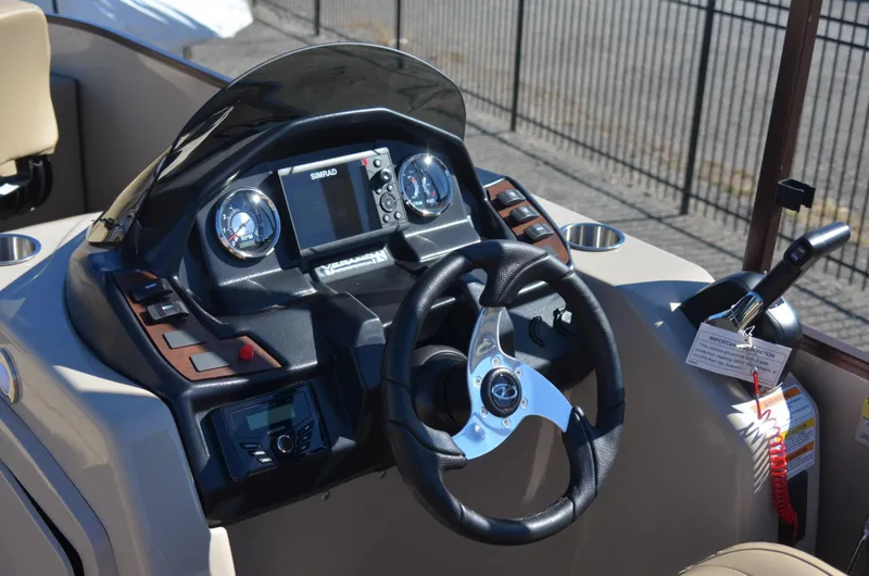 Slide: The Image of 2022 Veranda VF20F4 boat dashboard with steering wheel and control panel. - 10