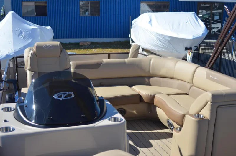 Slide: The Image of 2022 Veranda VF20F4 pontoon boat with beige seating and helm station. - 11