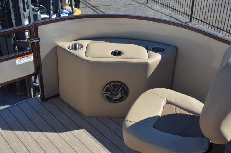 Slide: The Image of Interior of 2022 Veranda VF20F4 boat with beige seating and cup holders. - 16