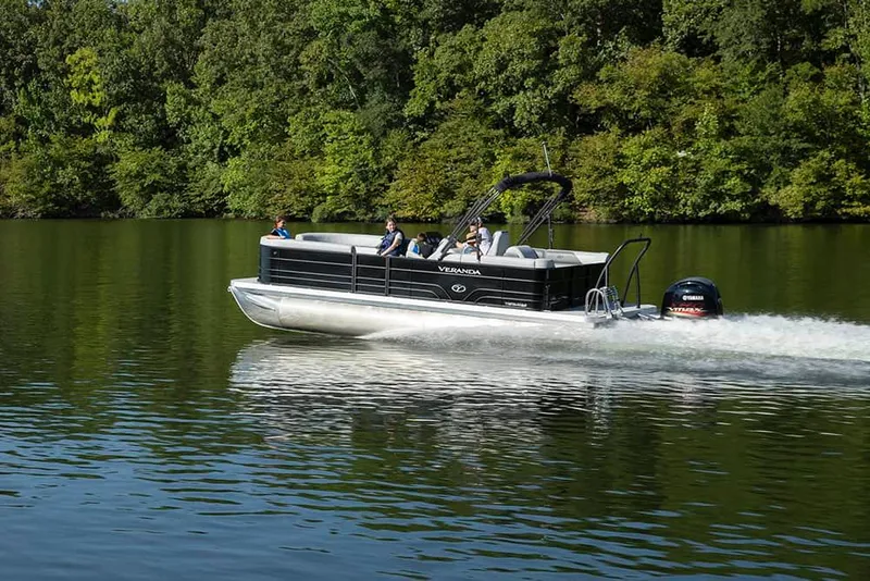 Slide: The Image of 2022 Veranda VISTA VIEW 22RC pontoon boat cruising on a lake. - 17