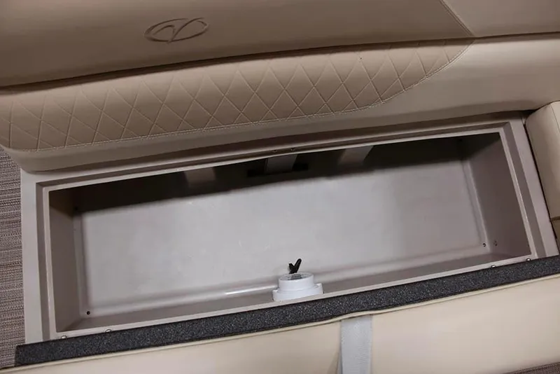 Slide: The Image of 2022 Veranda VISTA VIEW 22RC storage compartment with beige cushioned seating. - 18