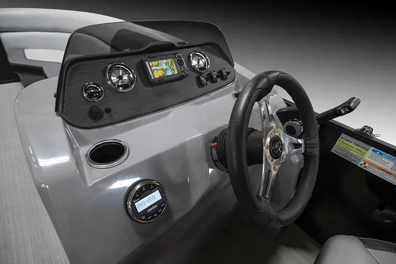 Slide: The Image of 2022 Veranda VISTA VIEW 22RC boat dashboard with steering wheel and navigation controls. - 19