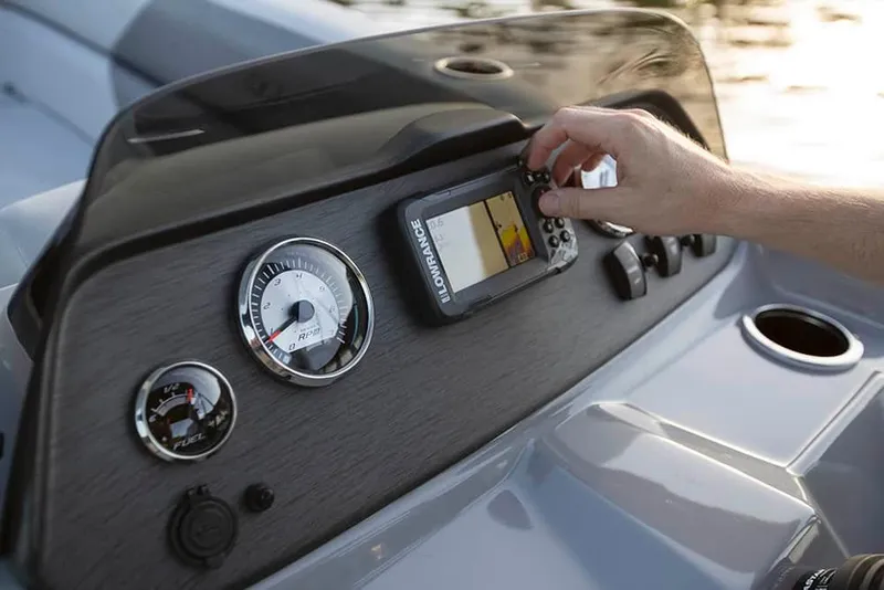 Slide: The Image of Close-up of 2022 Veranda VISTA VIEW 22RC boat dashboard with gauges and navigation system. - 22