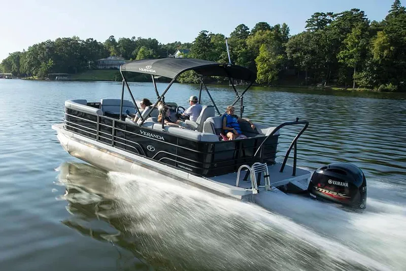 Slide: The Image of 2022 Veranda VISTA VIEW 22RC pontoon boat cruising on a lake. - 24