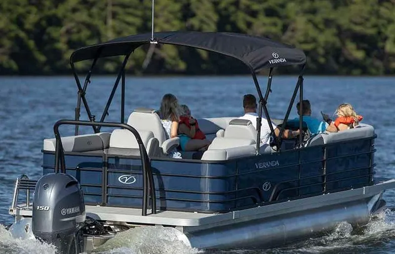 Slide: The Image of 2022 Veranda VISTA VIEW 22RC pontoon boat cruising on a lake. - 3