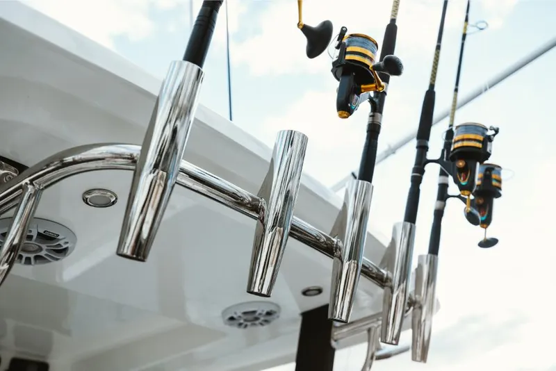 Slide: The Image of Fishing rods on Aquila 28 Molokai 2023 boat with rod holders. - 26