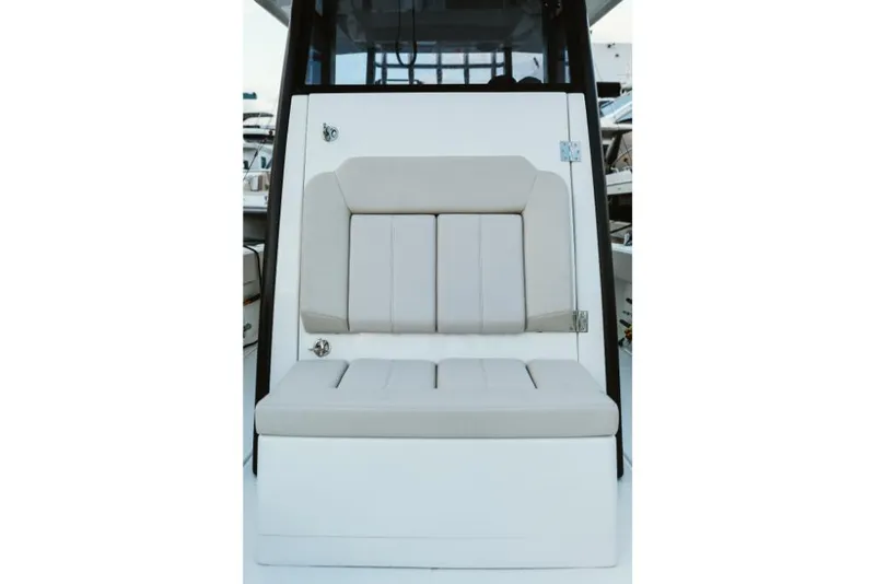 Slide: The Image of 2023 Aquila 28 Molokai boat seat with beige upholstery. - 35