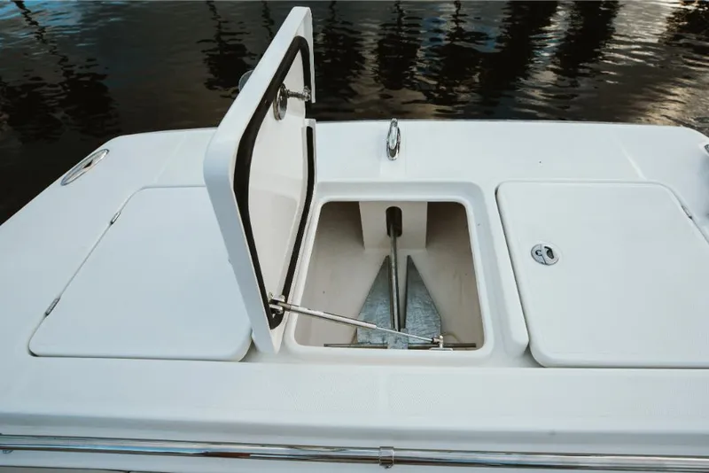 Slide: The Image of 2023 Aquila 28 Molokai boat storage compartments and anchor locker. - 42