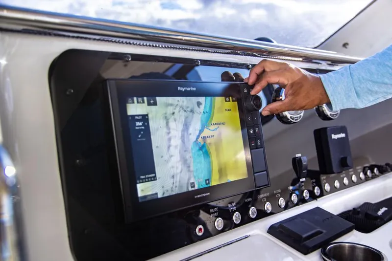 Slide: The Image of 2023 Aquila 28 Molokai Cuddy navigation system with Raymarine display. - 17