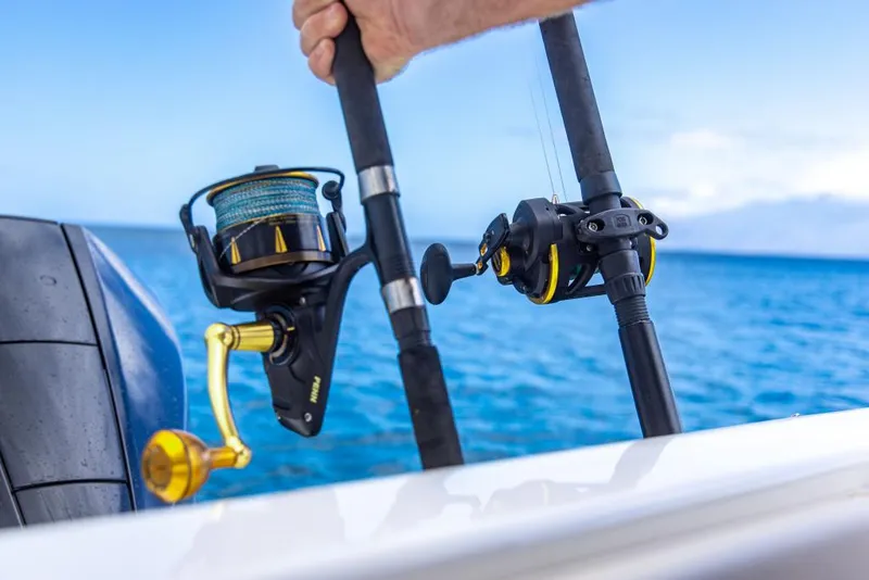 Slide: The Image of Fishing rods on a 2023 Aquila 28 Molokai Cuddy boat. - 39